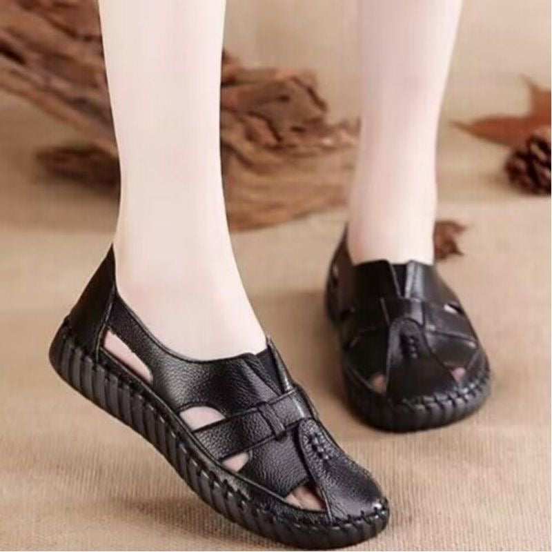 Sandalias planas de piel de vaca