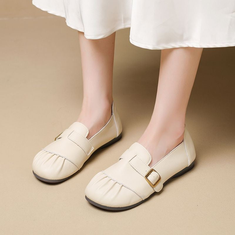 Zapatos de piel plisados con punta redonda