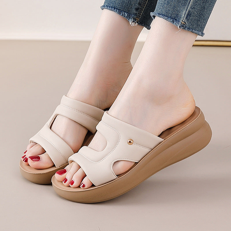 Sandalias de piel con cuña y suela blanda