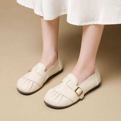 Zapatos de piel plisados con punta redonda