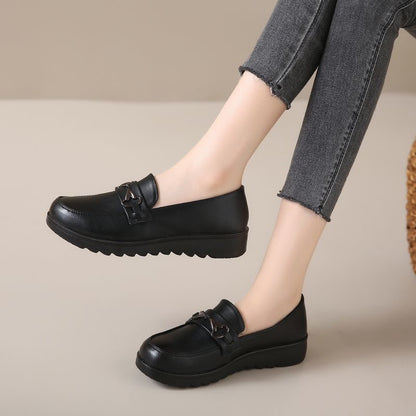 Zapatos antideslizantes de suela blanda de cuero genuino