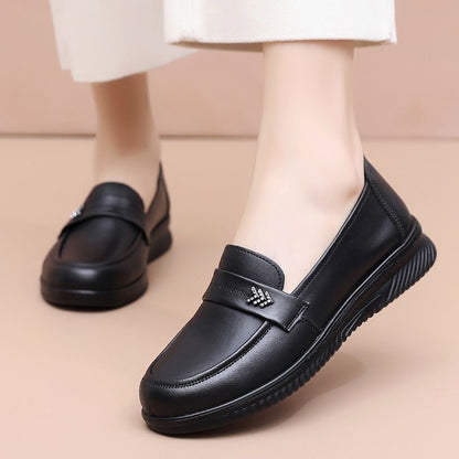 Zapatos cómodos de piel suave con punta redonda