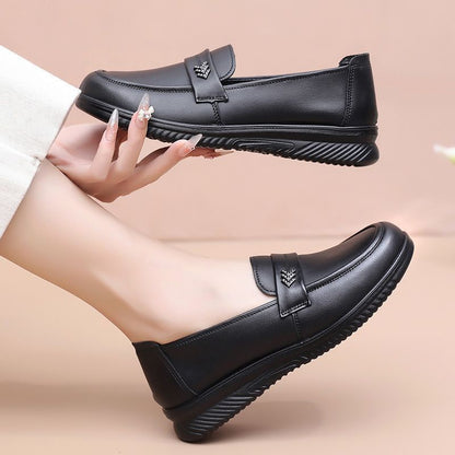 Zapatos cómodos de piel suave con punta redonda